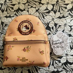 Pink floral Coach Minnie Mouse mini backpack